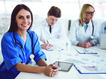 Photo of doctor at a conference table