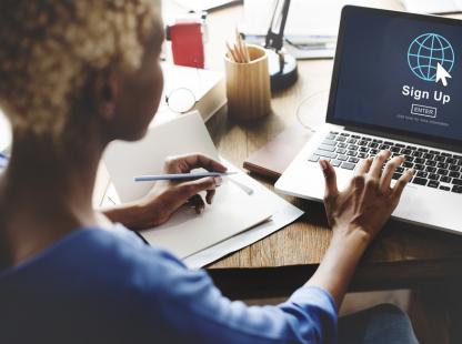 photo of a woman on a laptop